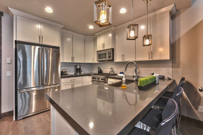 Gourmet Kitchen with Viking Appliances, Lovely Granite Counters, and a Stainless Farm Sink