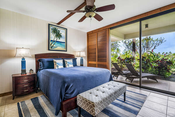 Primary bedroom with Large Bed, Ceiling Fan, and Lanai Access