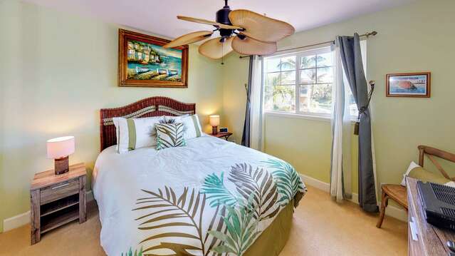 Queen Bedroom with ceiling fan and two nightstands