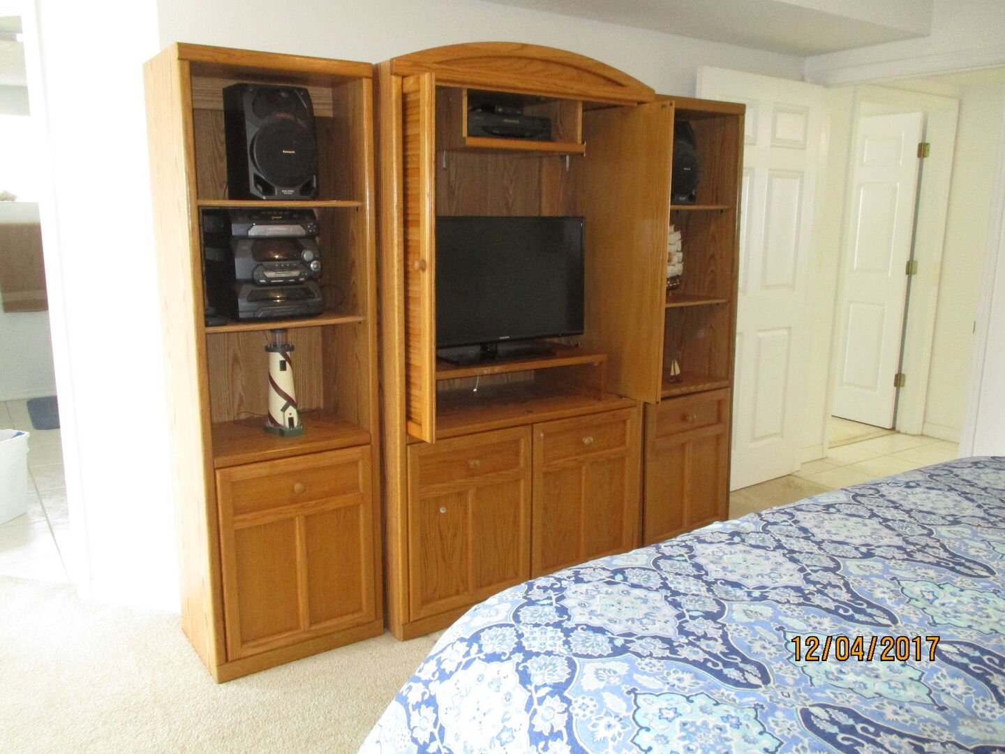 Master Bedroom - Entertainment center with CD Player and 32' TV