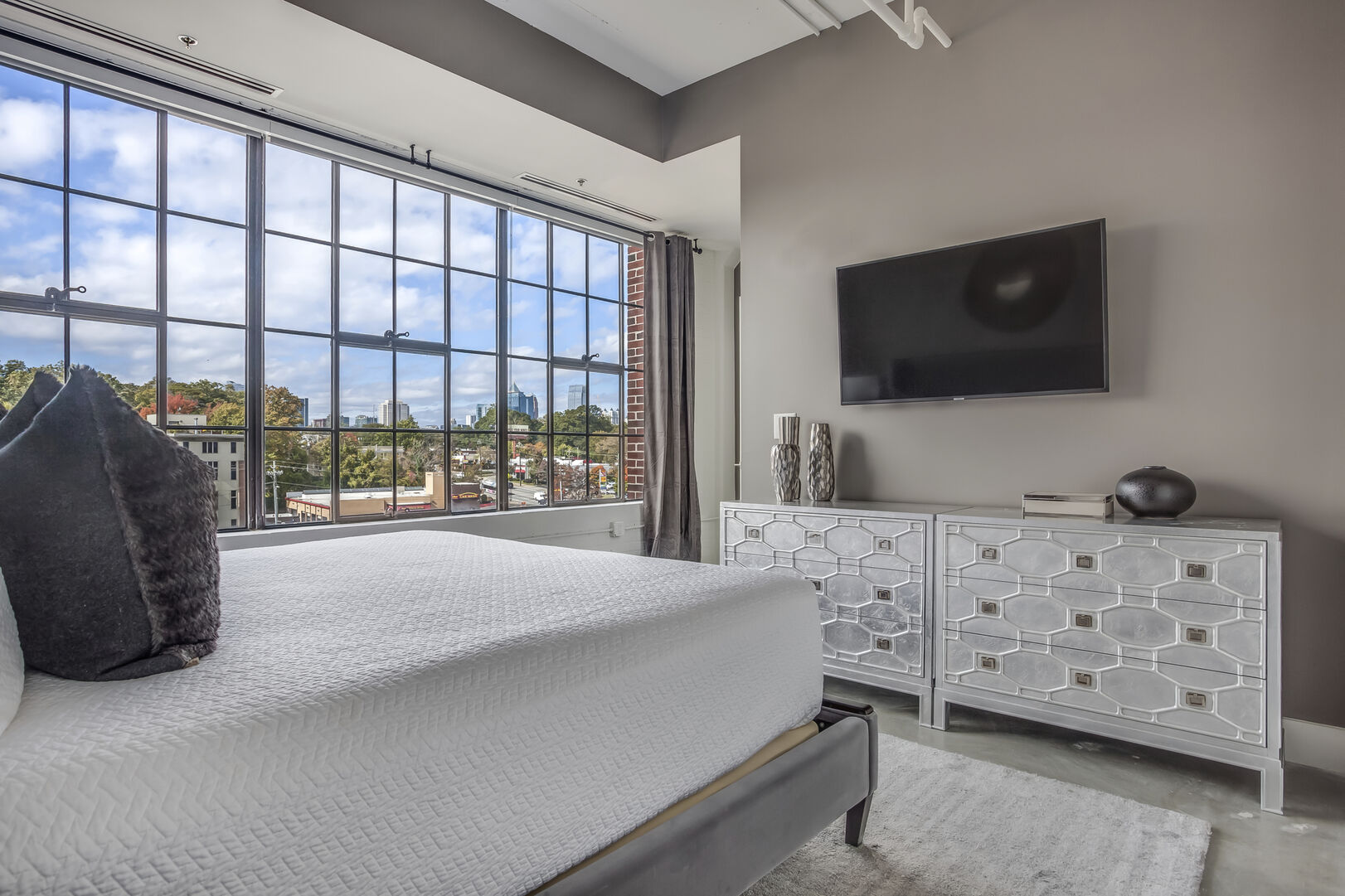 Master Bedroom in Lush Loft Has an Expansive View