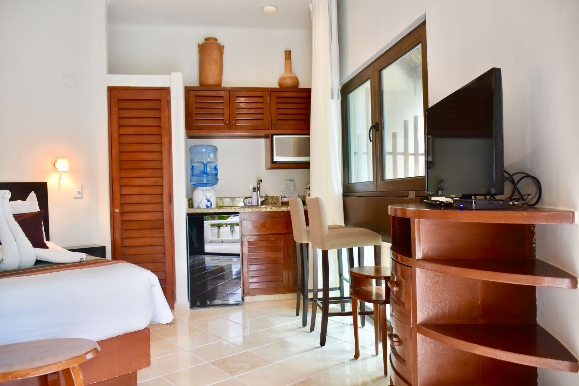 Amazing ocean front suite with queen size bed and kitchenette.