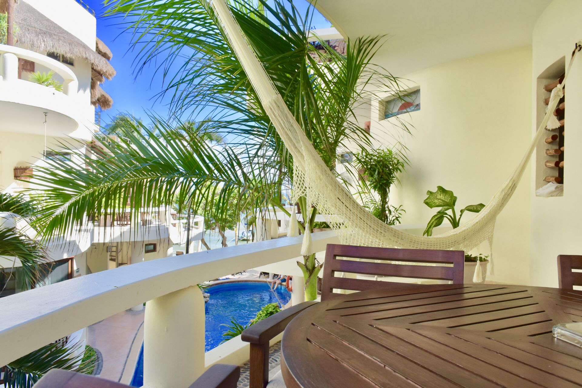 Ocean view balcony with chairs and hammock.Ocean view balcony with chairs and hammock.