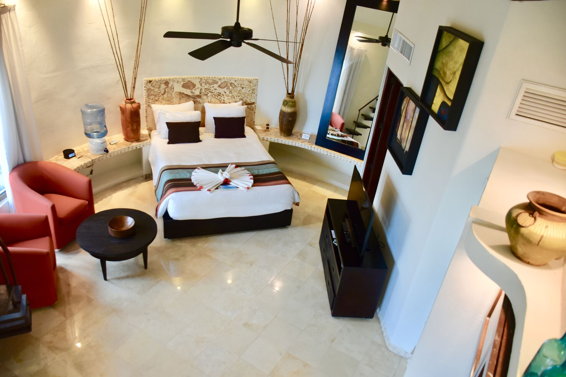 Fully furnished ocean front suite with queen size bed and kitchenette.