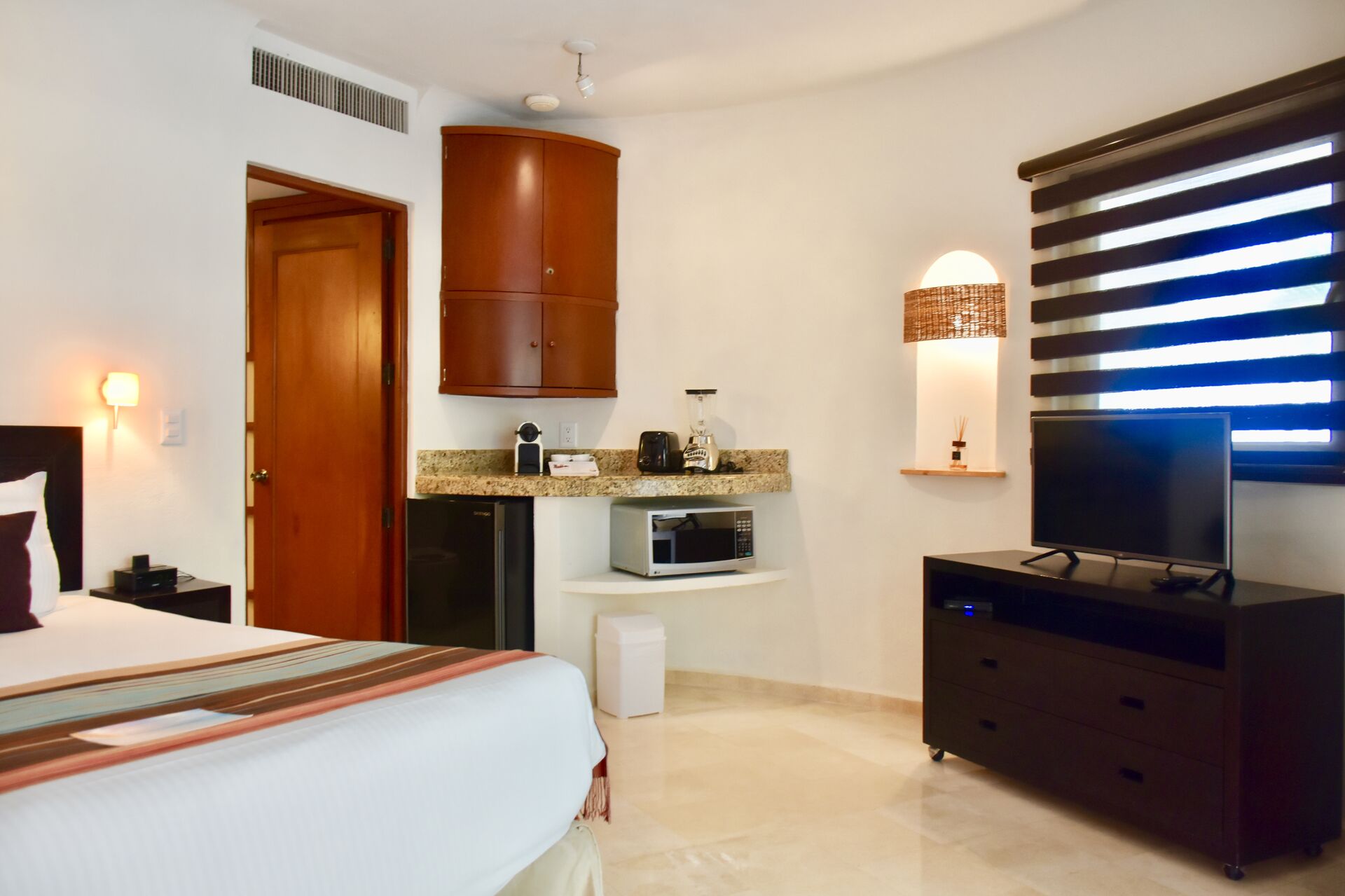 Spacious room with kitchenette.