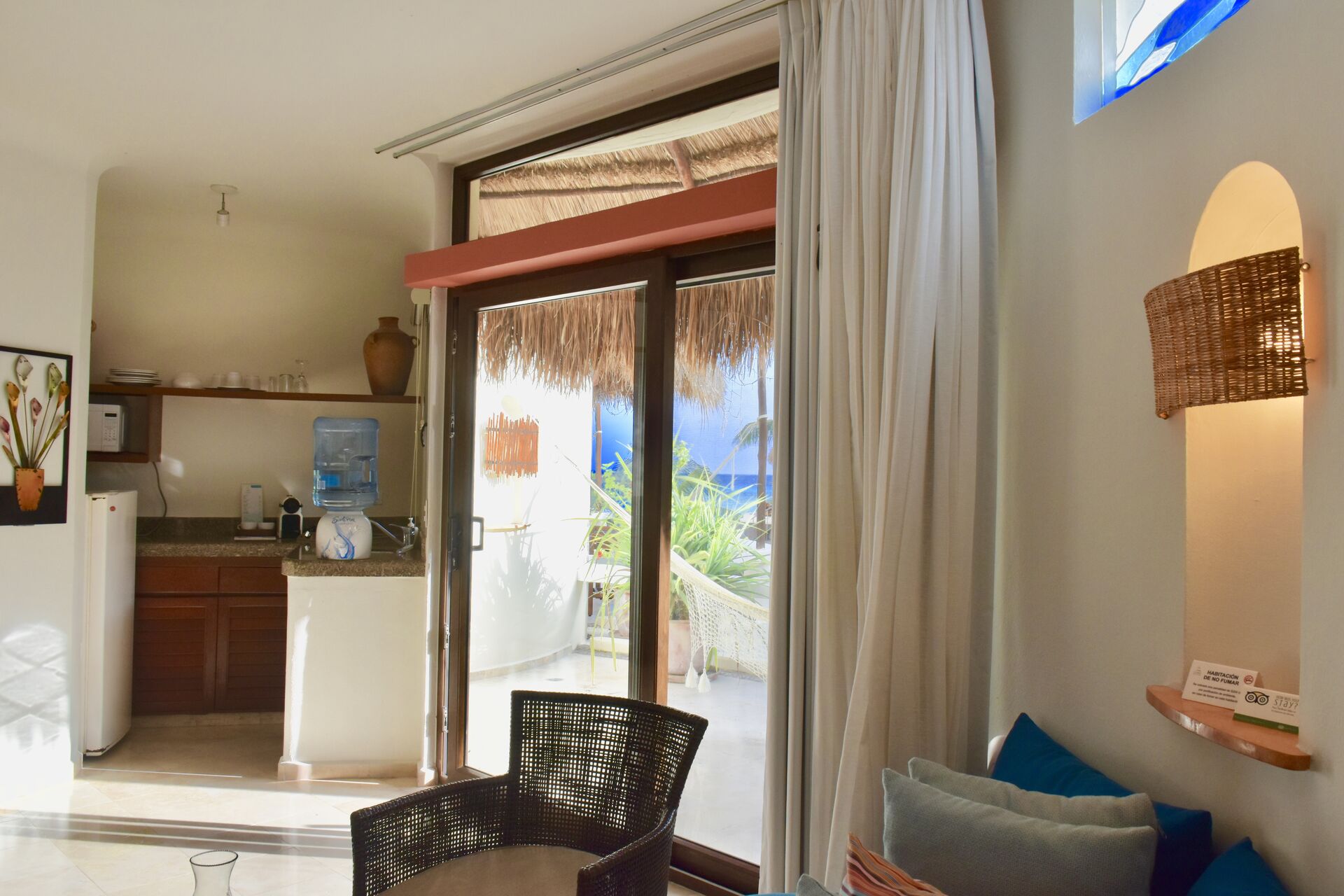 Amazing ocean view suite with queen size bed and kitchenette.