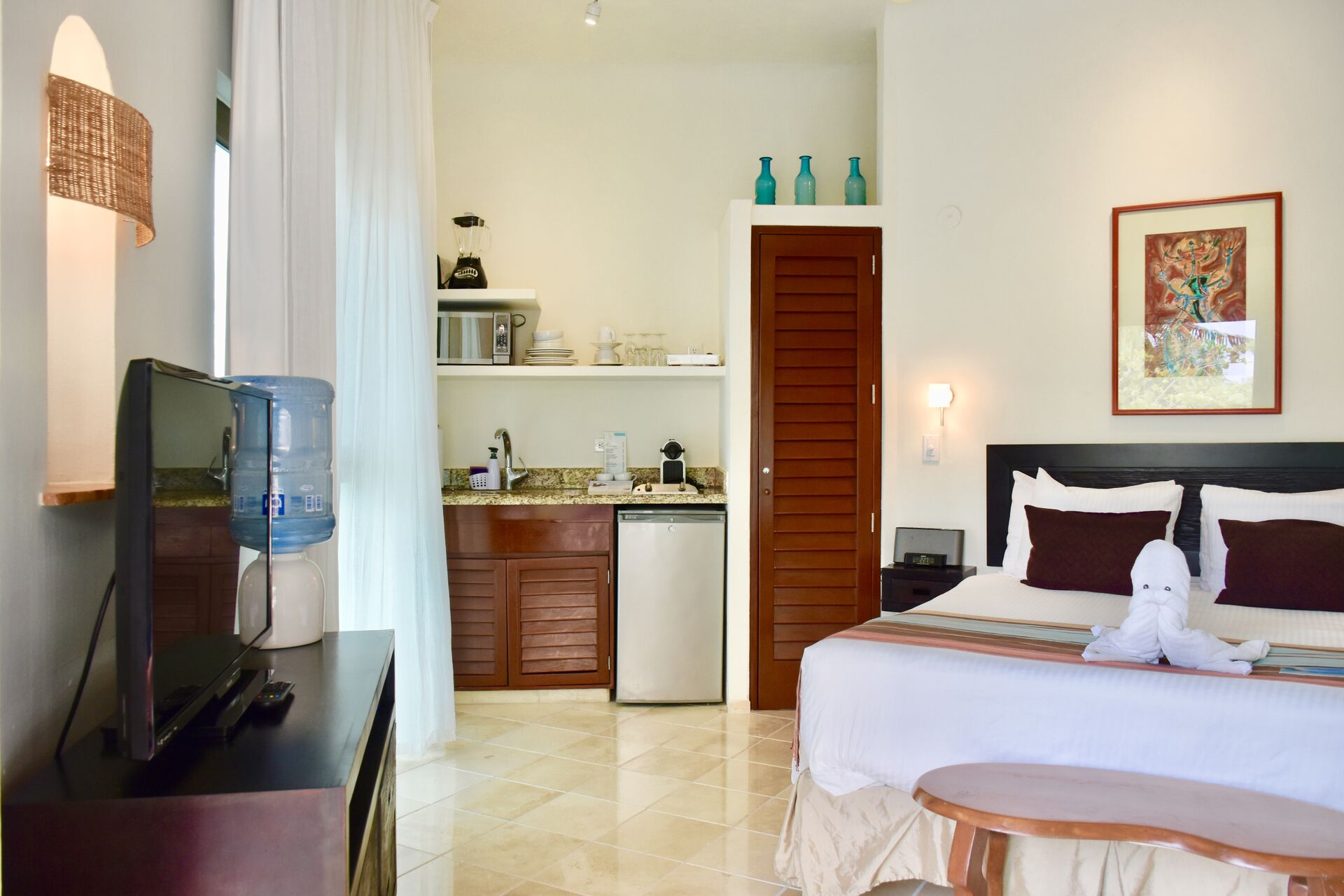 Amazing ocean front suite with queen size bed and kitchenette.