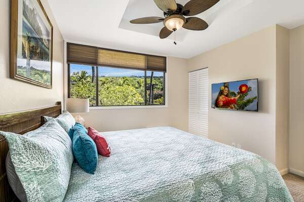 Bedroom 2 with King Bed and Hawaiian Decor at Kona Hawai'i Vacation Rentals