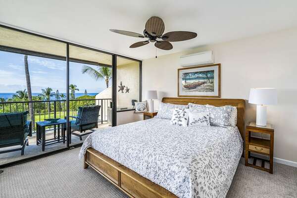 Primary Bedroom with King bed and Lanai Access Overlooking the Fairway
