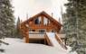 Ptarmigan Lodge is a full log cabin nestled in Pine and Spruce Woods with great Mountain Views!
