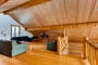 Another view of the gorgeous lofted ceilings with knotty pine.