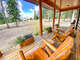 The covered front porch offers spectacular views and space to relax