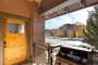 Door out to Yampa St. with grill at this pet friendly steamboat springs condo