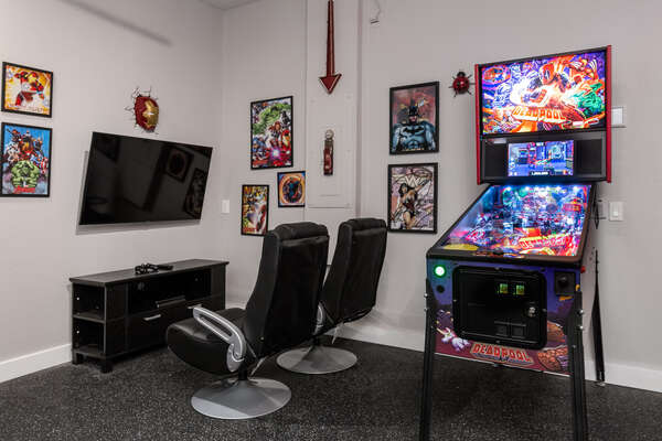 Play pinball or Playstation 4 on the 65-inch TV