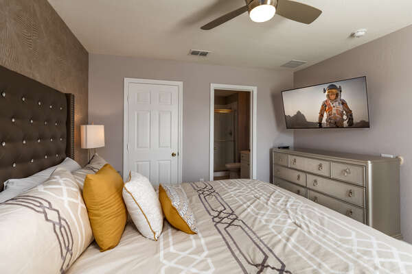 Watch TV and relax in this modern bedroom
