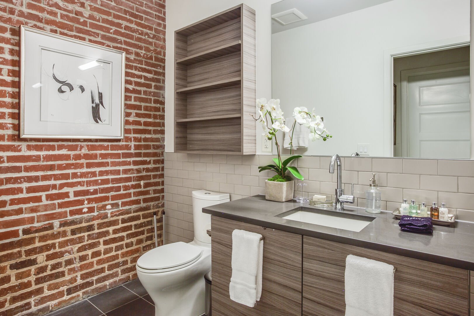 Bathroom with Brick Wall in our Ponce City Market Apartment