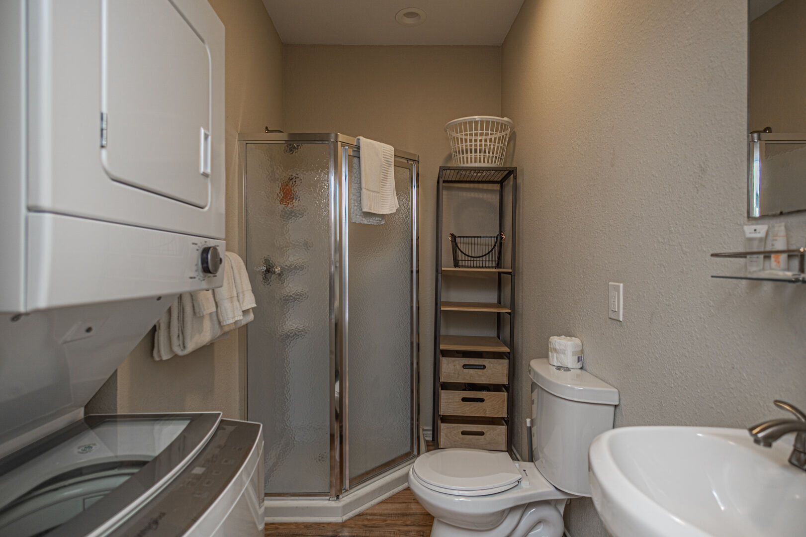 Full Bathroom with walk-in shower. Washer and dryer for guest convenience