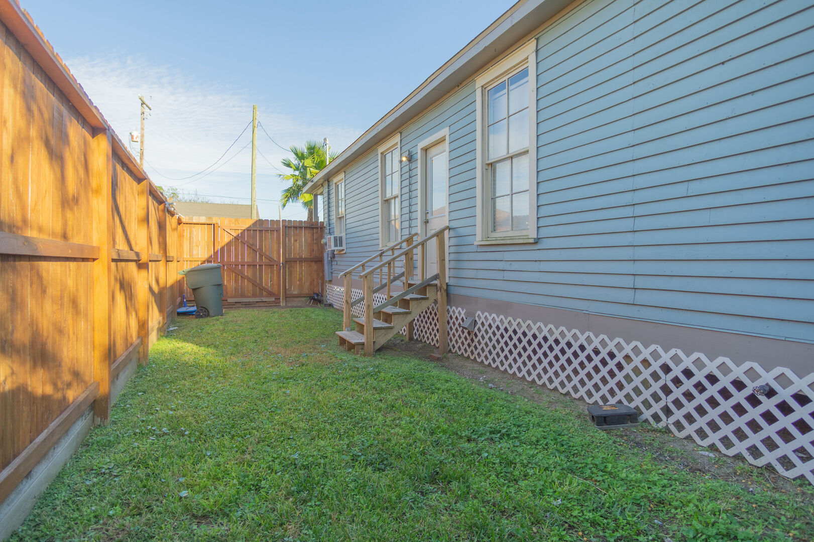 Fenced in side yard for you and your furry friends to enjoy!