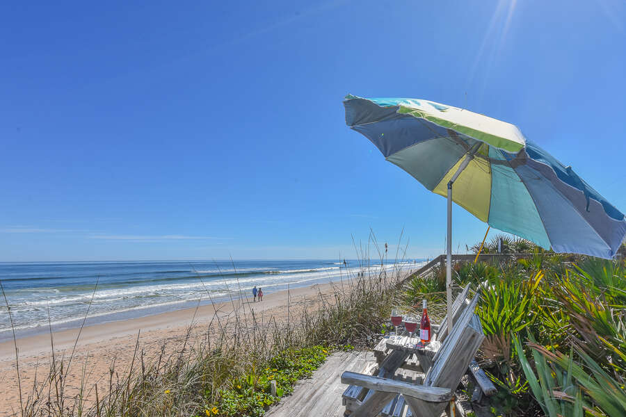 Oceanfront home with private dune deck located in serene south New Smyrna Beach.