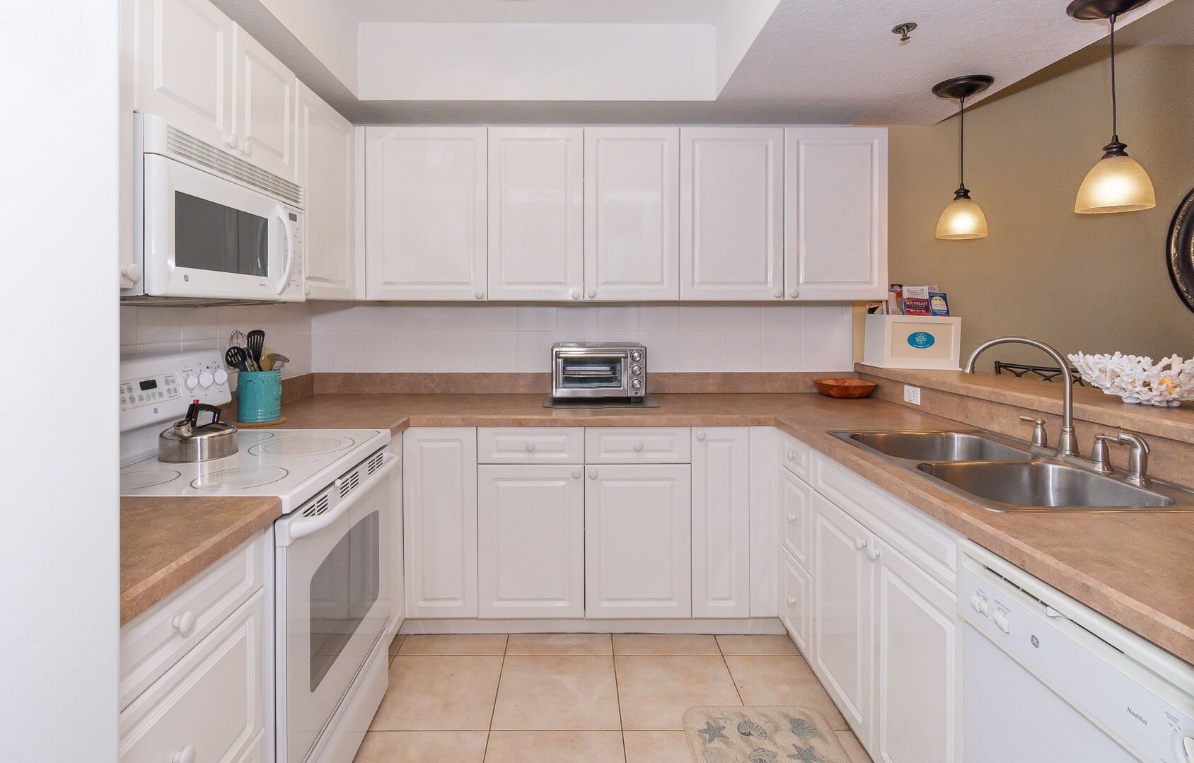 Full view of the kitchen in our condo rental in New Smyrna Beach