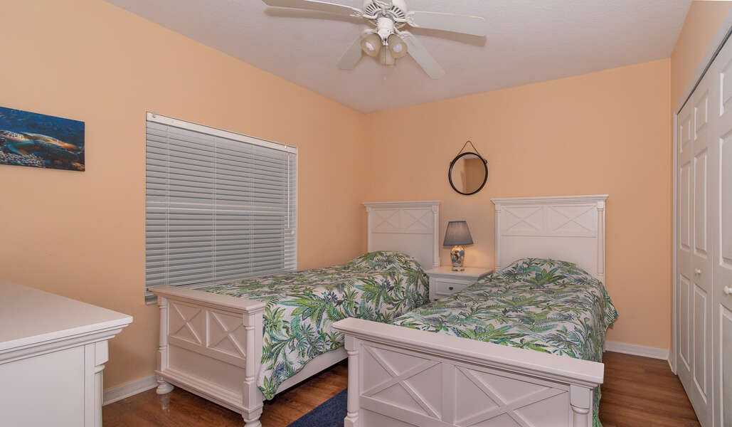 Two single beds in our condo rental in New Smyrna Beach