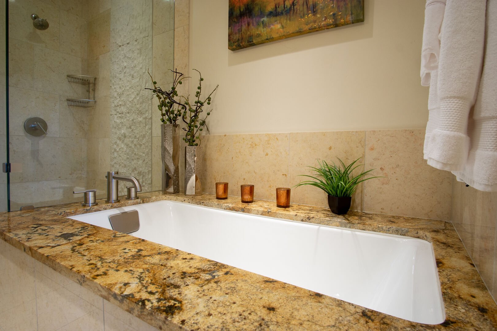 Primary bathroom with bathtub and separate shower in our Steamboat Springs Luxury Condo.