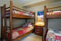 Bunk room with 1 twin bunk bed and 1 twin over full bunk bed - sleeps 5