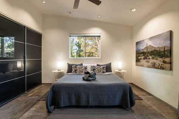 Master Bedroom with a King Bed and Private Balcony with Mountain Views
