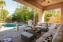 Cozy patio with sofa by the pool for your outdoor fun!