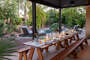 Have a great time catching up while having a meal in this beautifully set outdoor dining area