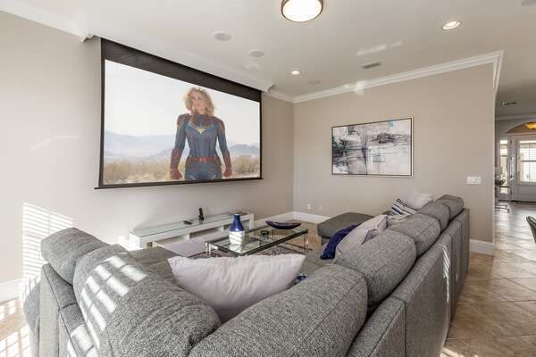 Have an amazing movie-watching experience with a 120-inch projection screen, Blu-ray player and surround sound