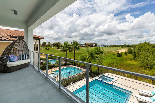 Look out onto the pool and golf course views