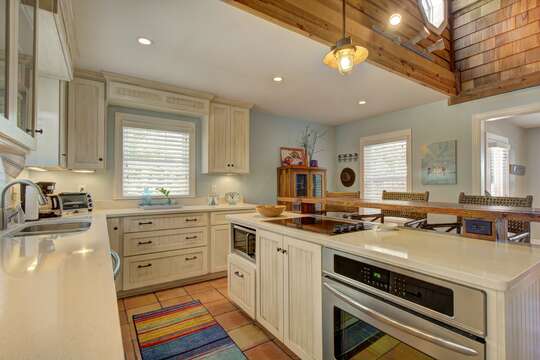 Kitchen features updated appliances and spacious counters