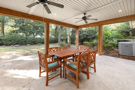 Outdoor seating for six and ceiling fans to keep you cool