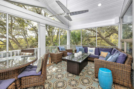 The large screened-in Back Porch has ample room for dining or just relaxing