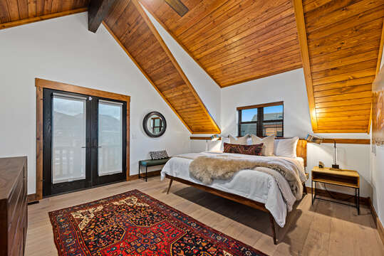 Upper level master bedroom with attached private bathroom