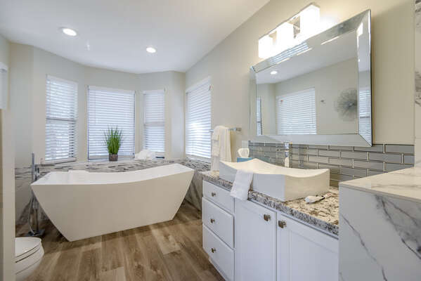 Large Soaking Tub and Plenty of Windows for Natural Light