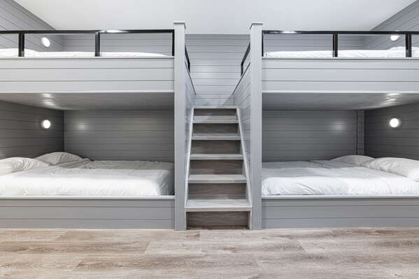 Bunk Room with Two Sets of Brand New Custom Built-in Queen over Queen Bunk Beds