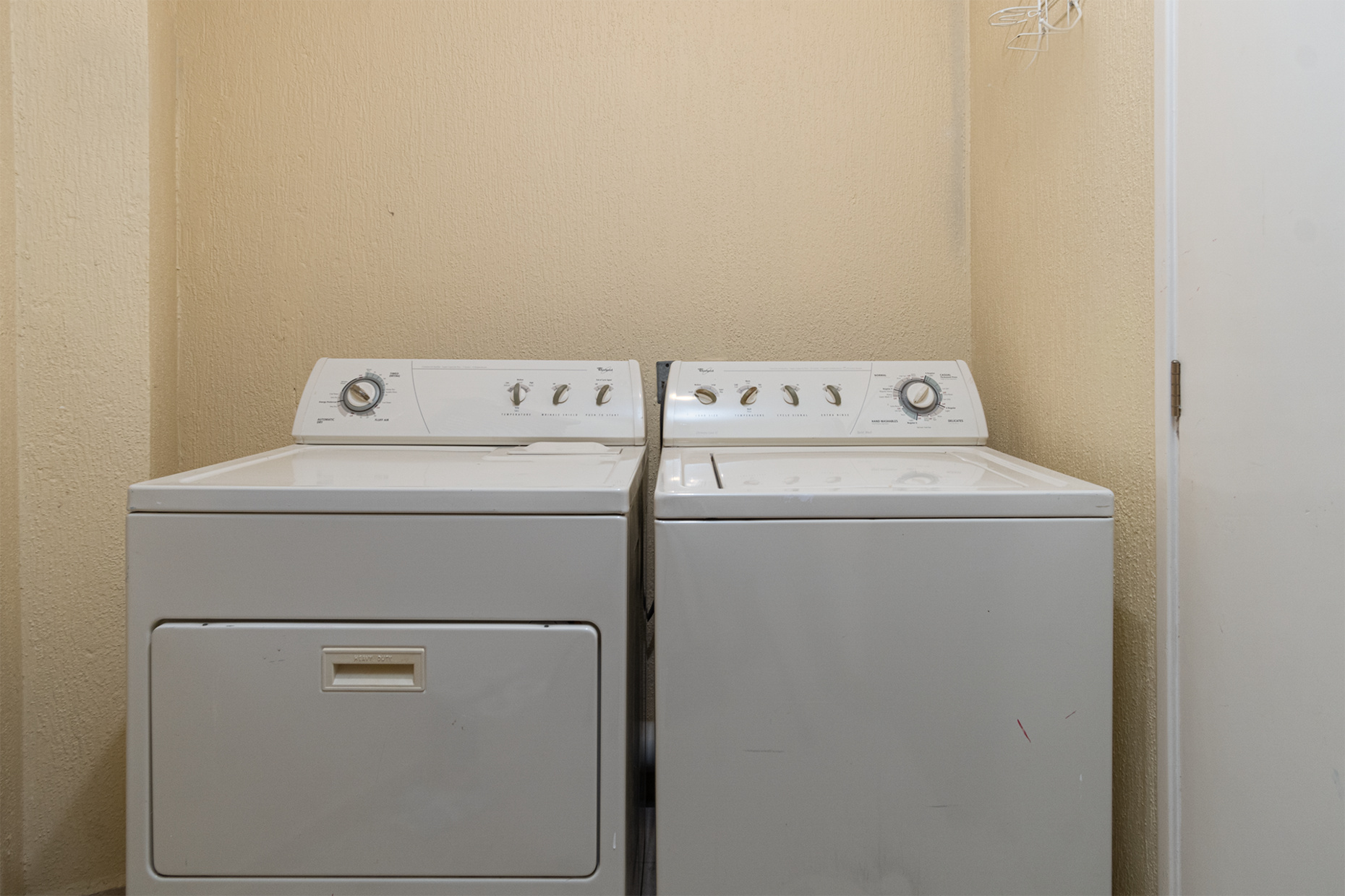 There is a washer and dryer in the utility room