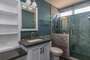 Nice bathroom with tile and glass shower.
