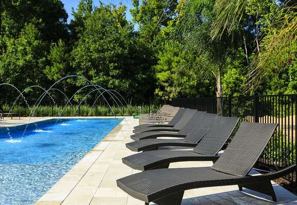 There are plenty of sun loungers by your south facing pool