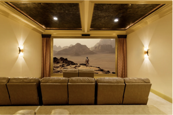 The private cinema with 185 inch screen and surround sound