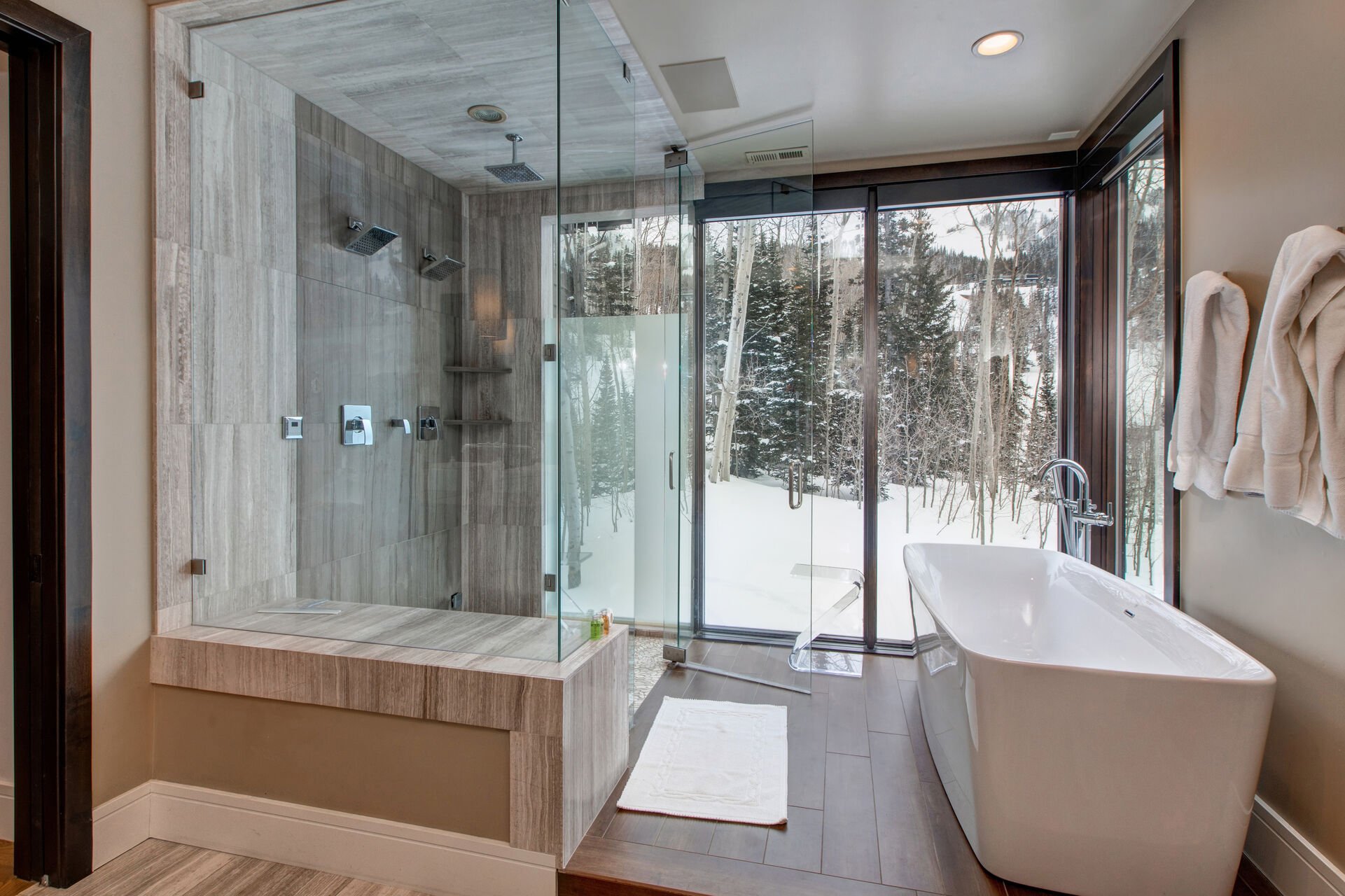 Tub and Shower with Mountain and Wooded Views
