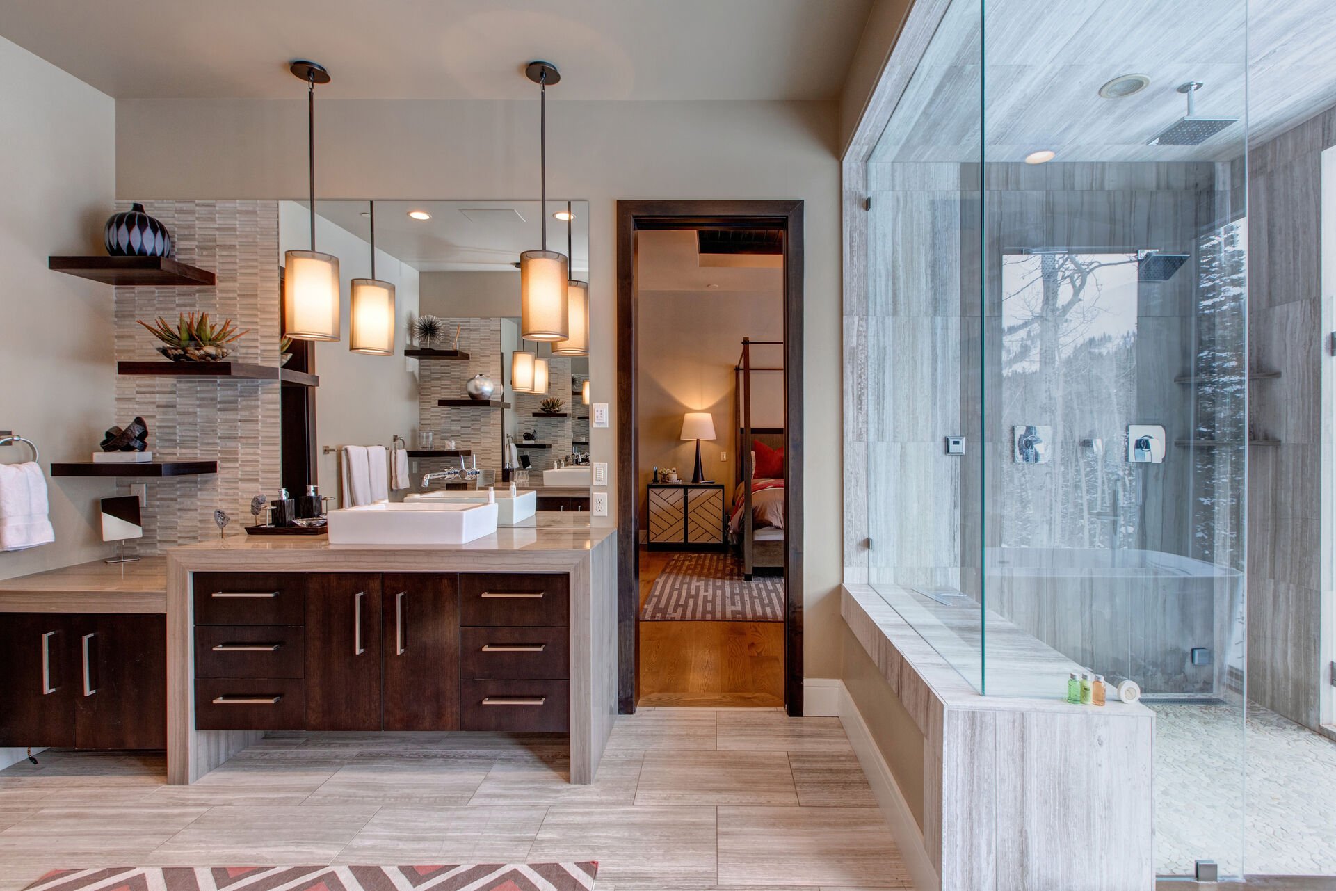 Grand Master Bath with Dual Vanities, a Large Soaking Tub and Dual-Head Steam Shower