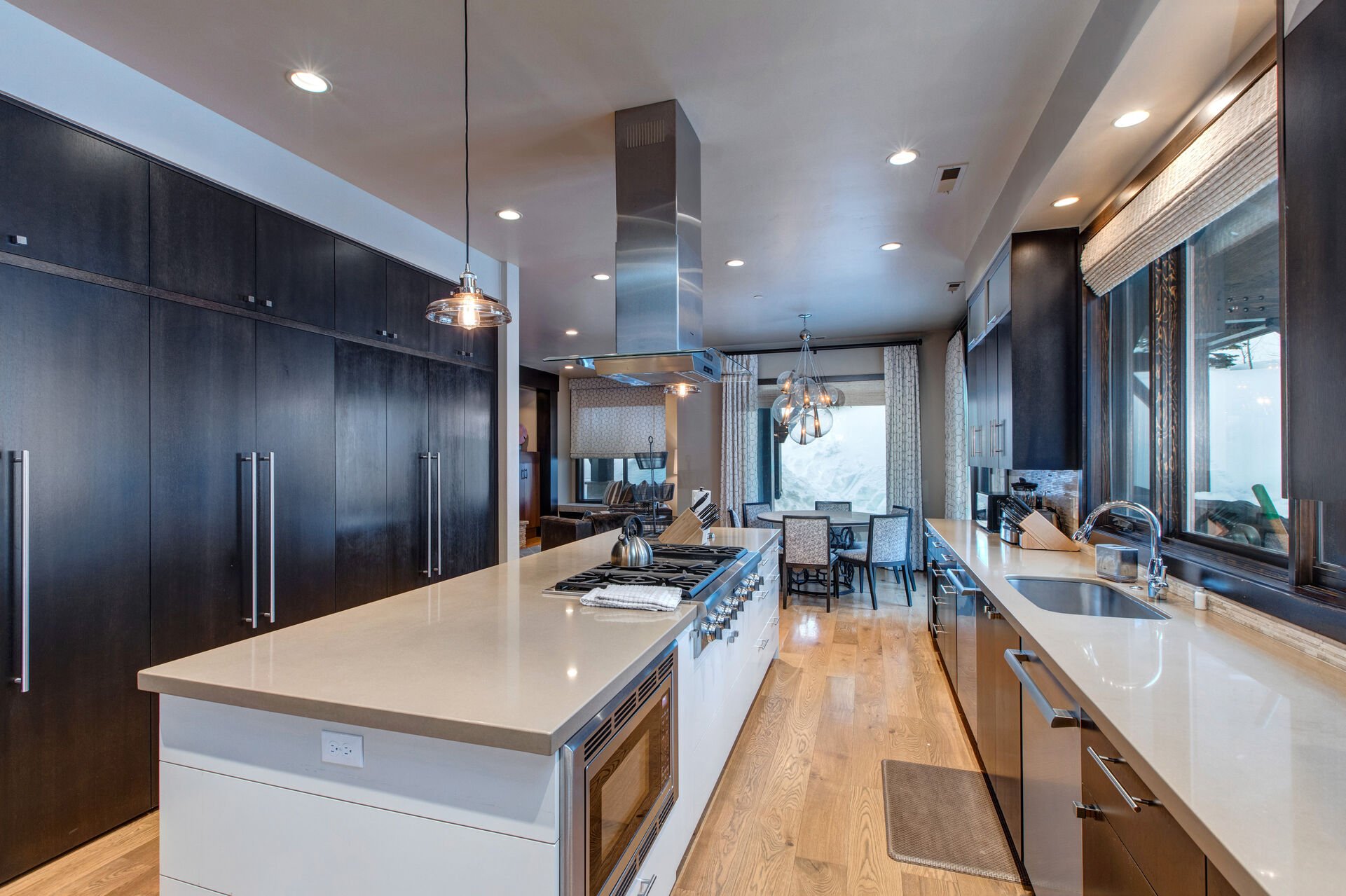 Gourmet Kitchen with a Breakfast Nook Table with Seating for 6 and a Sitting Area