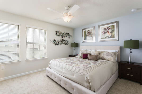Another master suite locate on the second floor with a king size bed