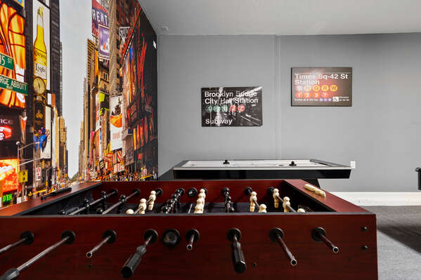 Foosball and an arcade machine up the fun that the game room provides