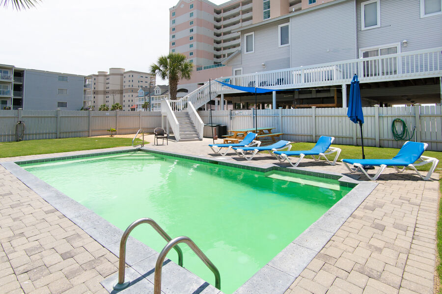 Absolute Paradise vacation home on a channel of the Cherry Grove Inlet in North Myrtle Beach | pool view 2 | Thomas Beach Vacations