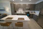 Fully-Equipped Kitchen with Energy-Saving Nest Thermostat - Corporate Housing - 1-Bedroom Spectacular Suites