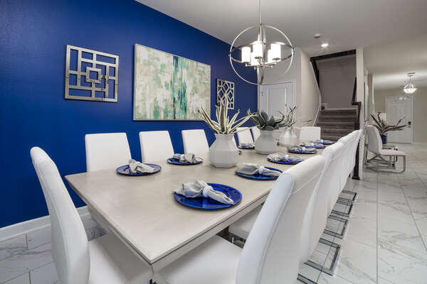 Dine at the formal dining table with seating for 14